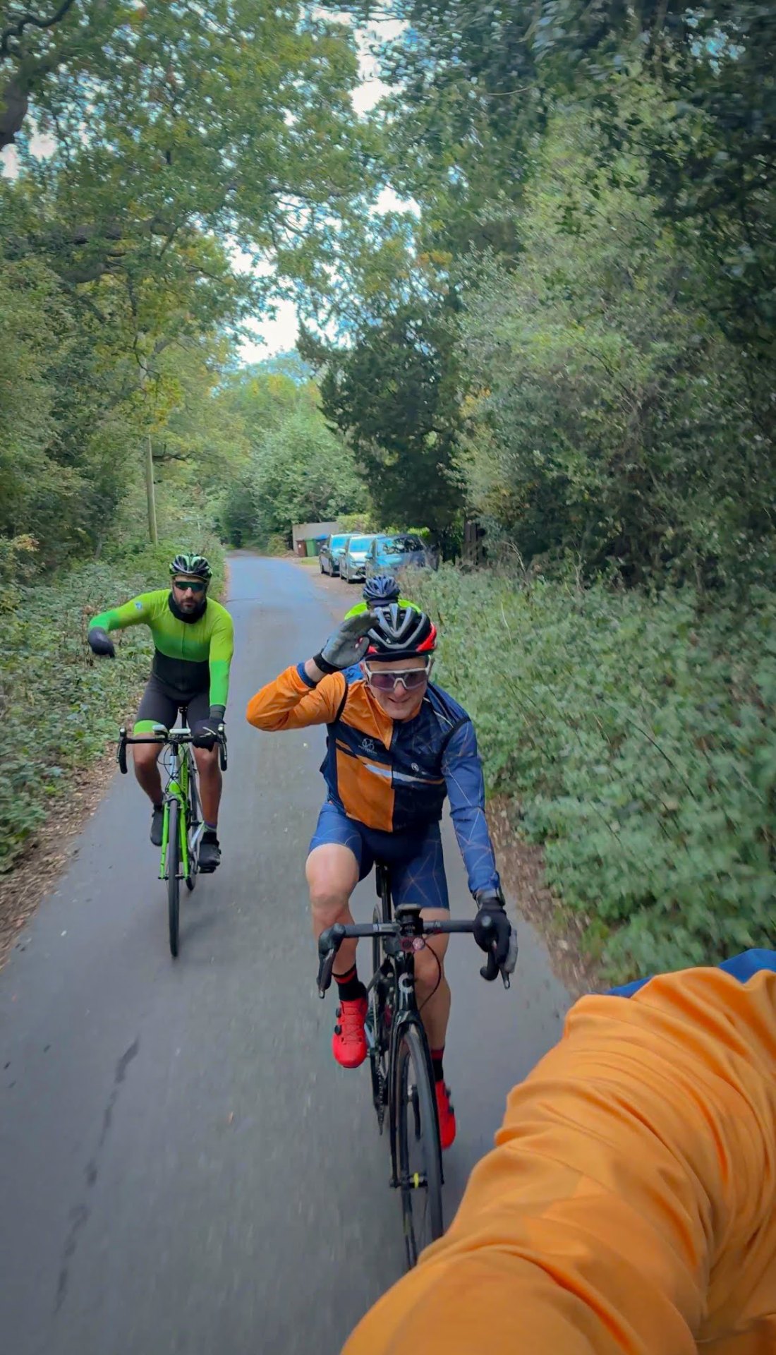 Cyclist's hands on dropped handlebars